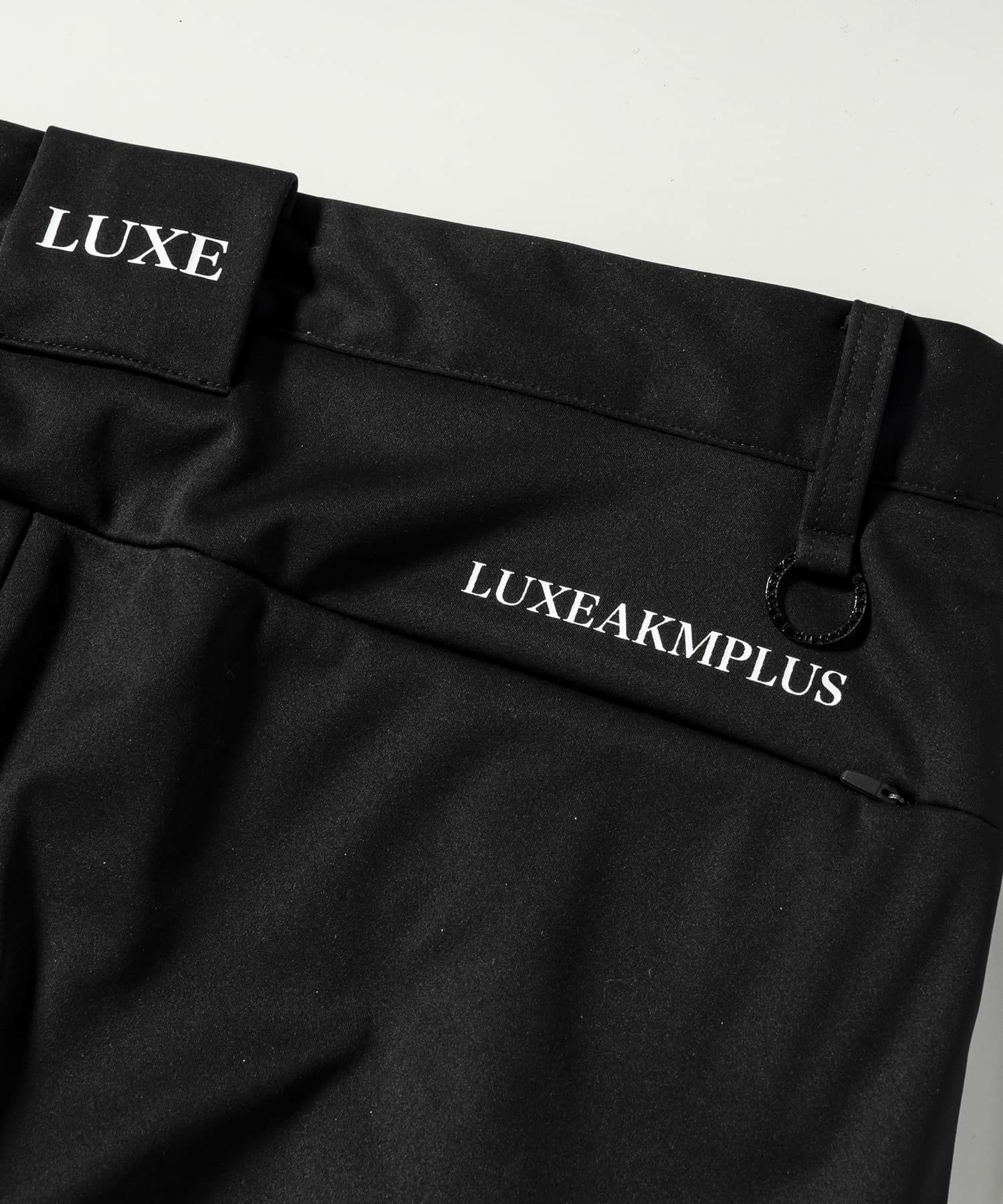 LUXEAKMPLUS(リュクスエイケイエムプラス)ゴルフ ビッグロゴ防風ロング