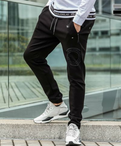 1PIU1UGUALE3 RELAX(ウノピゥウノウグァーレトレ リラックス)ラインストーンサークルロゴロングパンツ