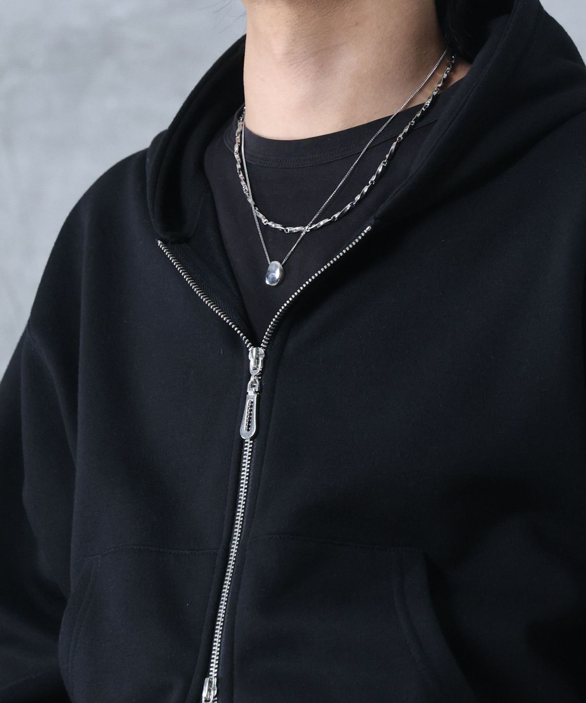 Confirm(コンファーム)サムホール フルジップフーディ メンズ